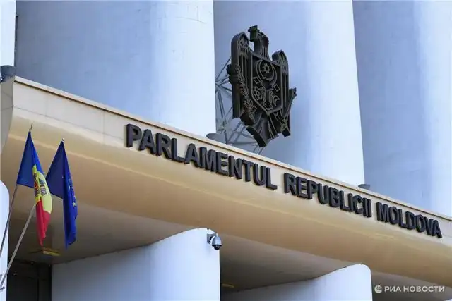 Партия Караман требует остановить ратификацию договора о поддержке Украины